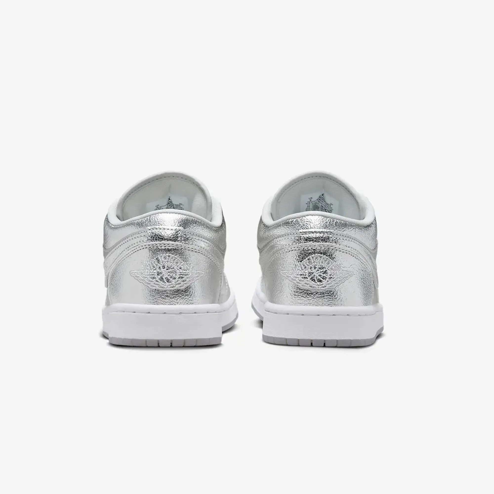 Jordan | WMN'S AIR JORDAN 1 LOW SE  { METALLIC SILVER/PHOTON DUST-WOLF GREY